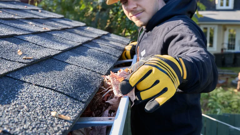 Close finished aluminum gutter and fascia detail suited to Southeast rain