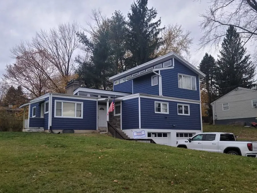 Seamless gutter installation — ASU Construction, Owego NY