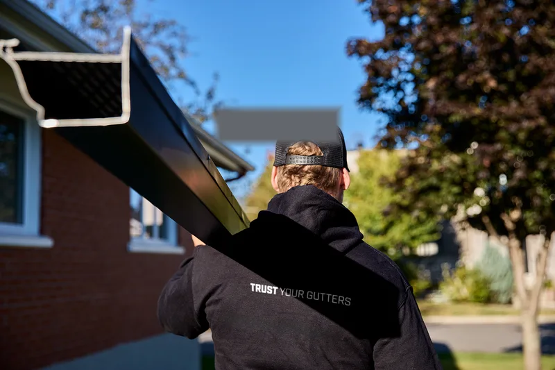 New seamless gutters installed on a Greenville-area home