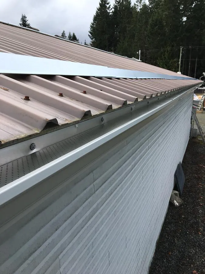 Gutter Clean System® on a metal roof gutter — Mid Island Gutters, Parksville BC