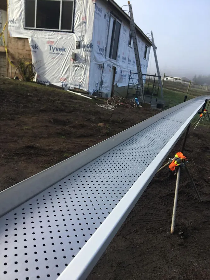 Seamless gutter with Alu-Rex protection, formed on site — Mid Island Gutters, Parksville BC