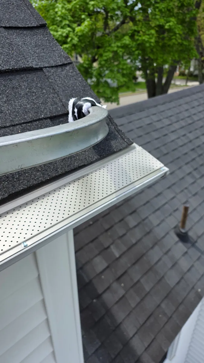 Screening fitted to a curved roofline — Nature Guard Gutters, Biddeford ME
