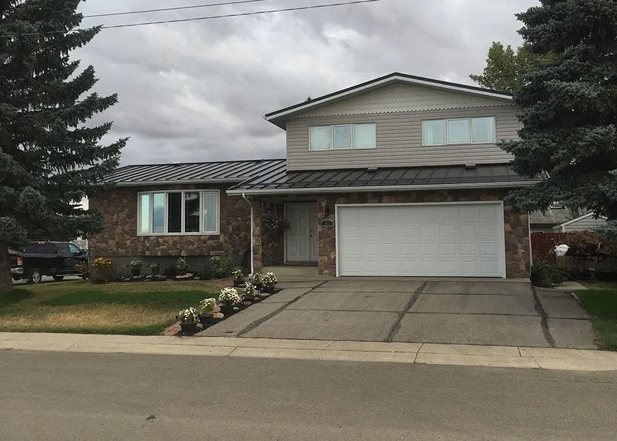 Residential exterior project — Gutter Installation, Gutter Guards, Soffit, Fascia, Siding, Roofing, Clearwater County AB