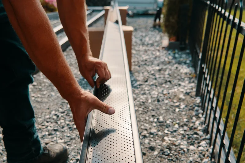 Close-up of a perforated Alu-Rex gutter guard