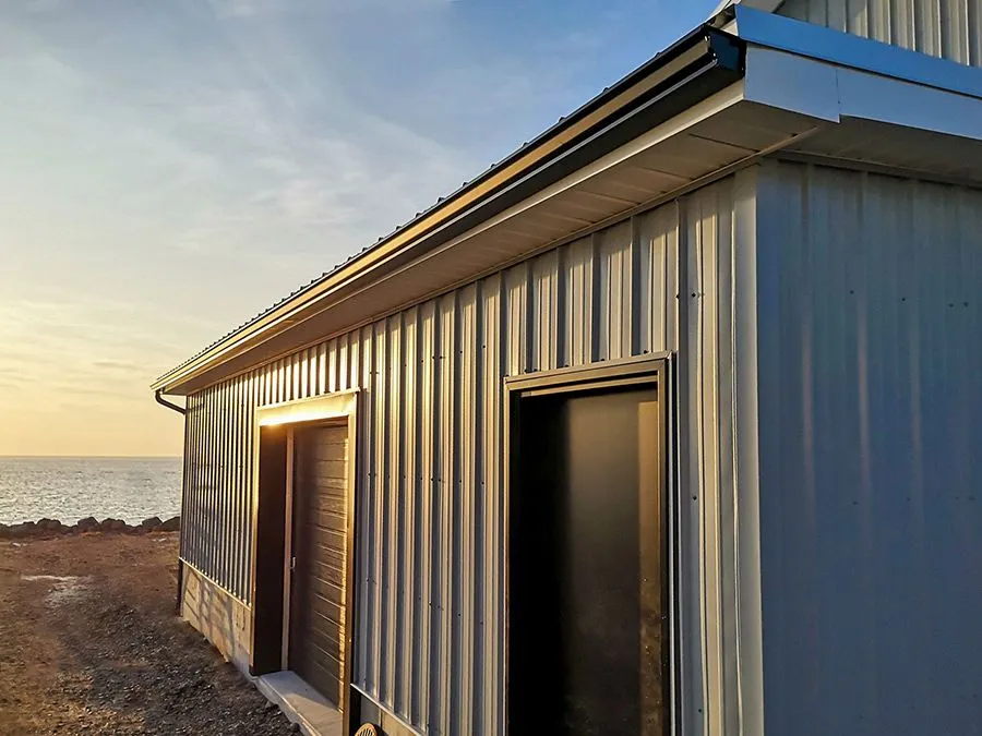 Completed exterior work — Weeks Seamless Gutter, Doctors Cove AB